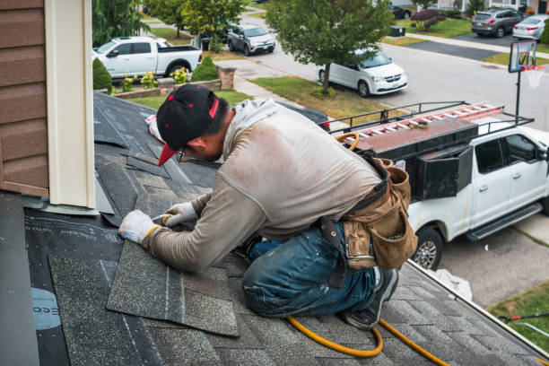 Professional Roof Replacement technician working in Leasburg, NC